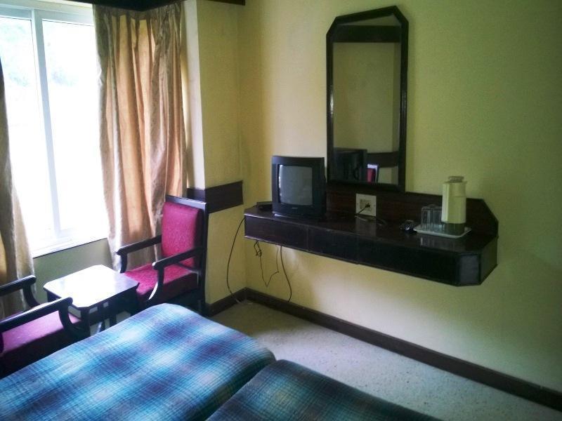 Hotel New Rajdarshan Мадикери Екстериор снимка