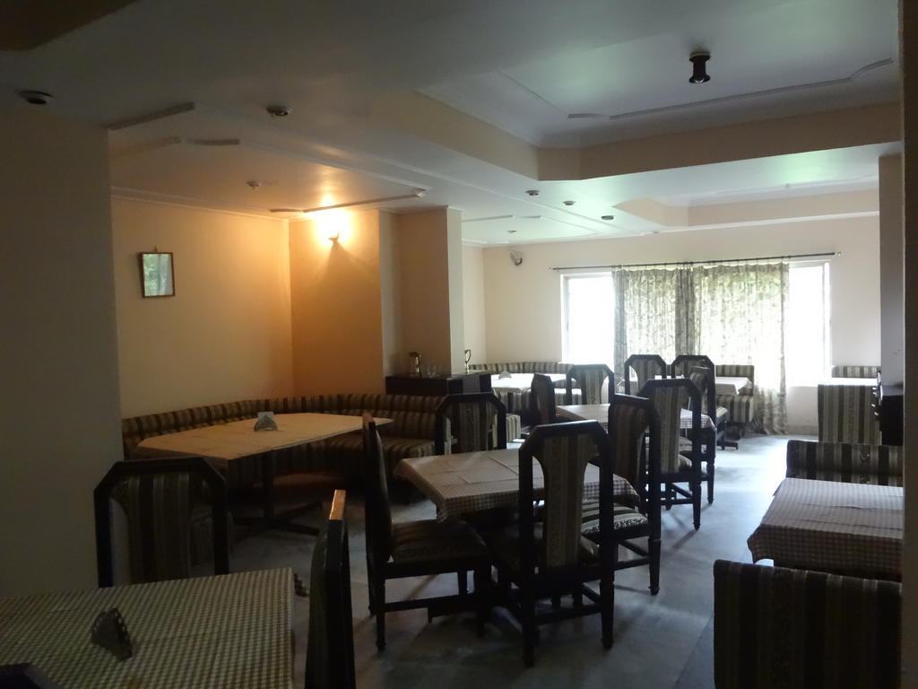 Hotel New Rajdarshan Мадикери Екстериор снимка